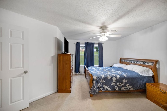 111 Coachman Ct, Anderson, SC 29625 - carpeted bedroom with baseboards, a textured ceiling, and ceiling fan