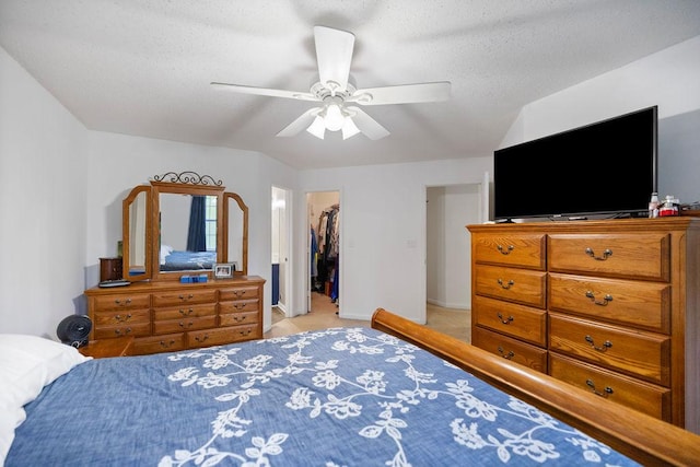 111 Coachman Ct, Anderson, SC 29625 - bedroom with a walk in closet, ceiling fan, light colored carpet, baseboards, and a closet