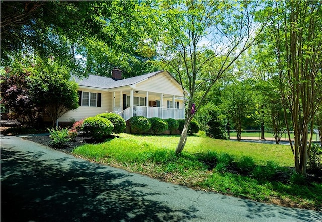 100 Berkeley Ct, Clemson, SC 29631 - view of front of property with covered porch, a front yard, and a chimney
