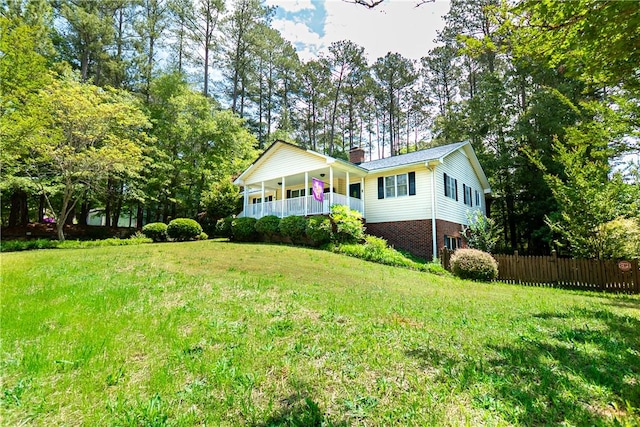 100 Berkeley Ct, Clemson, SC 29631 - single story home with a chimney, a porch, brick siding, and view of wooded area