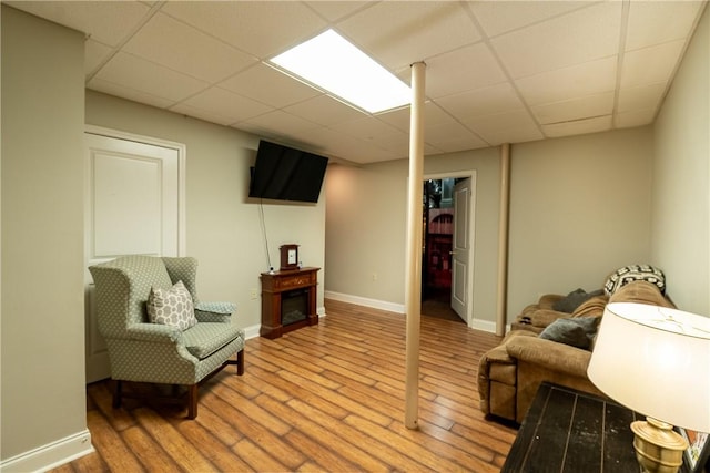 100 Berkeley Ct, Clemson, SC 29631 - sitting room with wood finished floors, a drop ceiling, baseboards, and a fireplace