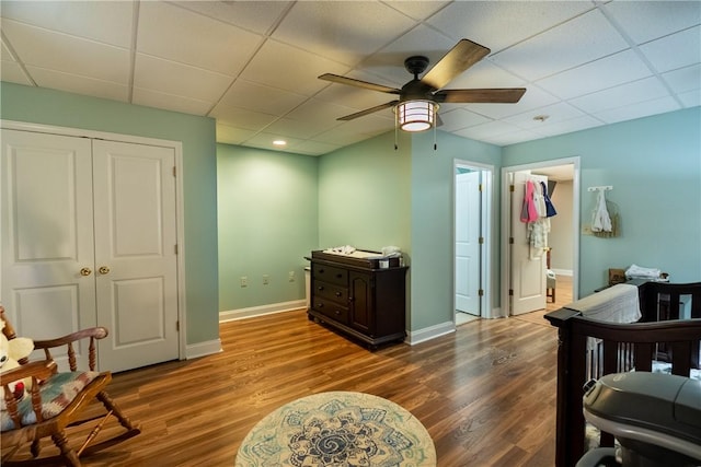 100 Berkeley Ct, Clemson, SC 29631 - bedroom featuring a drop ceiling, a closet, dark wood finished floors, baseboards, and a ceiling fan