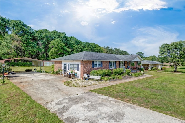 203 Greenmeadow Cir, Anderson, SC 29626 - single story home featuring a front lawn, driveway, brick siding, and a detached carport