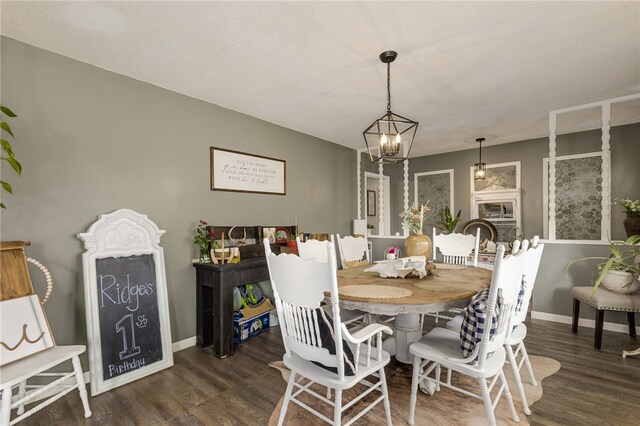 203 Greenmeadow Cir, Anderson, SC 29626 - dining space featuring wood finished floors, a chandelier, and baseboards