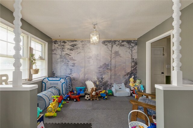 203 Greenmeadow Cir, Anderson, SC 29626 - recreation room featuring carpet floors and an accent wall