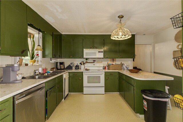 203 Greenmeadow Cir, Anderson, SC 29626 - kitchen featuring white appliances, a sink, green cabinets, a peninsula, and light countertops