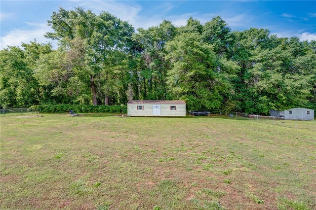 203 Greenmeadow Cir, Anderson, SC 29626 - view of yard featuring an outdoor structure and a storage unit