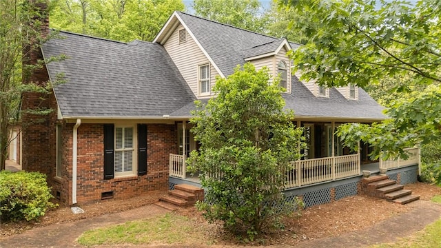 503 Columbine Ct, Easley, SC 29642 - new england style home with covered porch, roof with shingles, brick siding, and a chimney
