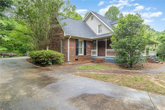503 Columbine Ct, Easley, SC 29642 - view of front facade featuring a porch, brick siding, crawl space, and roof with shingles