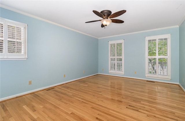 503 Columbine Ct, Easley, SC 29642 - unfurnished room with light wood-style floors, a ceiling fan, baseboards, and ornamental molding