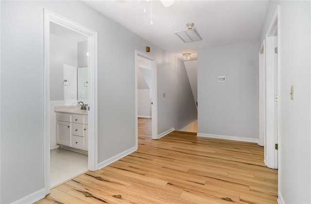 503 Columbine Ct, Easley, SC 29642 - corridor with light wood-type flooring and a sink
