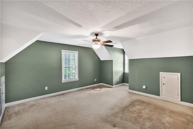 205 Washington Ave, Easley, SC 29640 - bonus room with ceiling fan, healthy amount of natural light, lofted ceiling, a textured ceiling, and carpet floors
