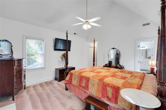 bedroom with high vaulted ceiling, baseboards, ceiling fan, a closet, and connected bathroom