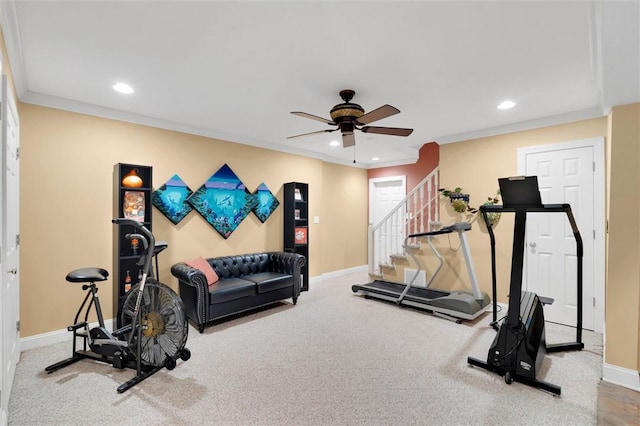 workout area featuring baseboards, a ceiling fan, recessed lighting, crown molding, and carpet