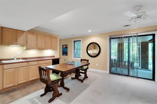 dining room with ornamental molding, baseboards, a ceiling fan, recessed lighting, and light carpet