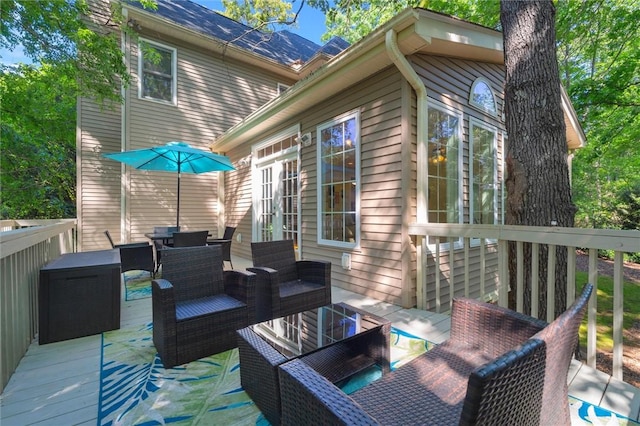 deck featuring outdoor lounge area