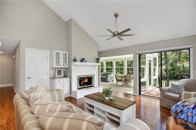 32 Par Harbor Way, Salem, SC 29676 - living room featuring high vaulted ceiling, a high end fireplace, ceiling fan, plenty of natural light, and baseboards