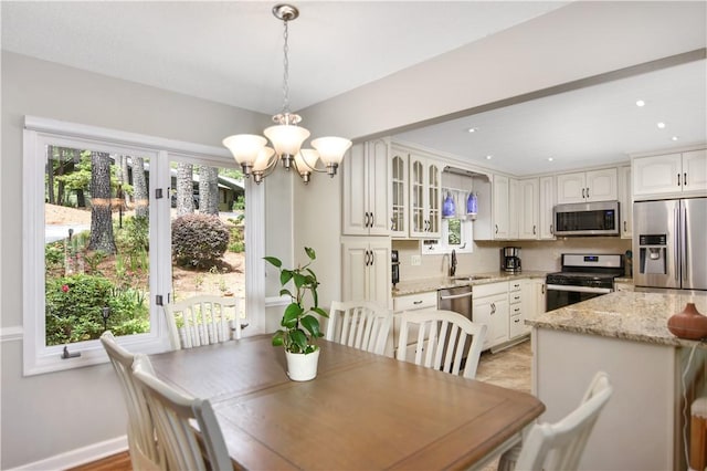 32 Par Harbor Way, Salem, SC 29676 - dining area with a chandelier and recessed lighting