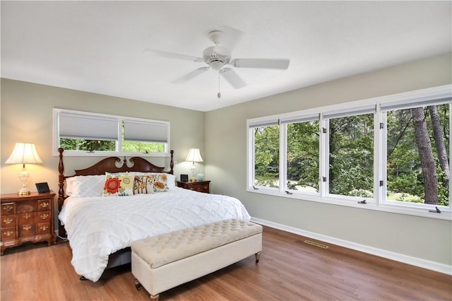 32 Par Harbor Way, Salem, SC 29676 - bedroom featuring baseboards, wood finished floors, and ceiling fan