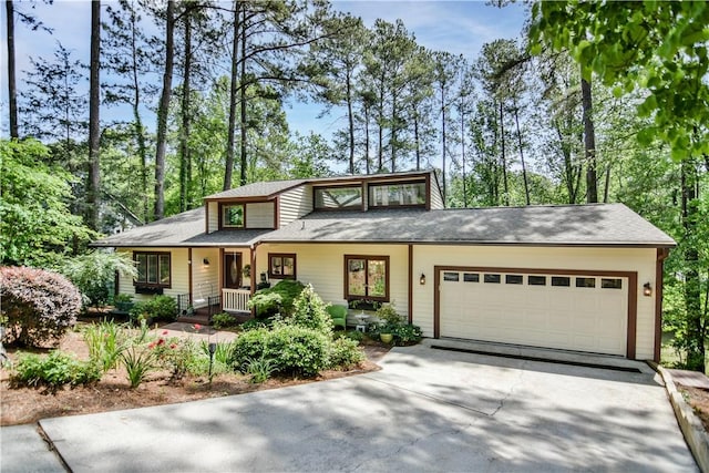 32 Par Harbor Way, Salem, SC 29676 - view of front of house with driveway, a garage, and covered porch
