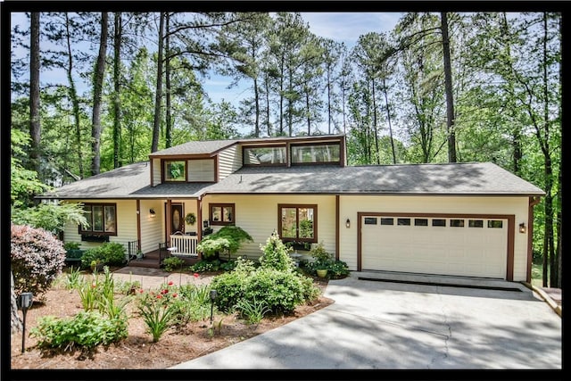 32 Par Harbor Way, Salem, SC 29676 - view of front of house featuring driveway, an attached garage, and covered porch