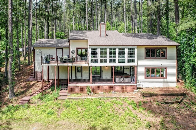 32 Par Harbor Way, Salem, SC 29676 - rear view of house featuring a chimney, a deck, and a view of trees