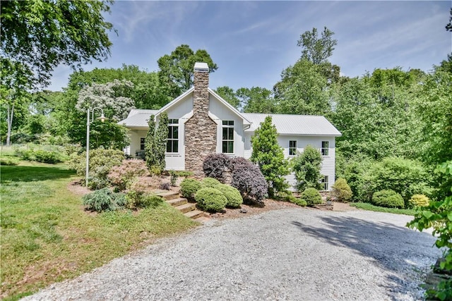 224 Edgewood Dr, Seneca, SC 29678 - view of front of house with a chimney, a metal roof, and stone siding