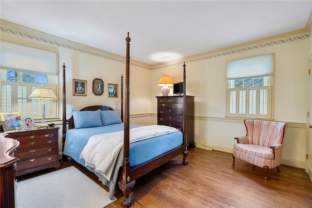 401 Berkshire Hl, Anderson, SC 29621 - bedroom featuring multiple windows, wood finished floors, baseboards, and crown molding