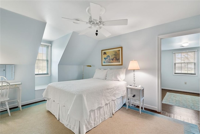 401 Berkshire Hl, Anderson, SC 29621 - bedroom with multiple windows, lofted ceiling, baseboards, and a ceiling fan