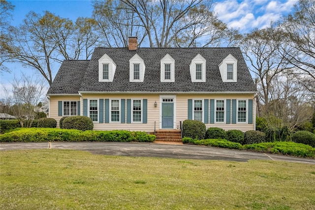 401 Berkshire Hl, Anderson, SC 29621 - cape cod-style house featuring a chimney, a front yard, driveway, and entry steps