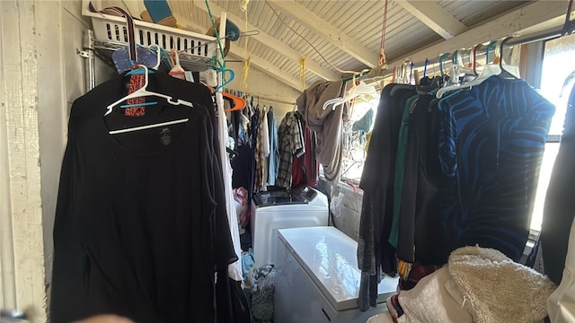 spacious closet featuring washing machine and dryer