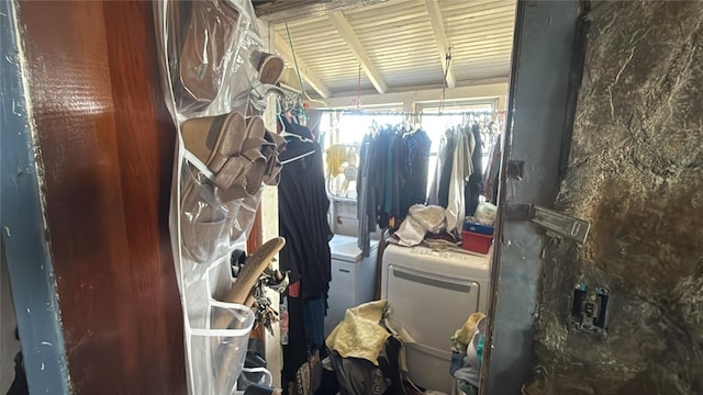 spacious closet featuring washer / dryer
