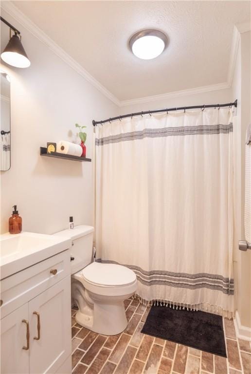 full bathroom with toilet, vanity, brick patterned flooring, ornamental molding, and a shower with curtain