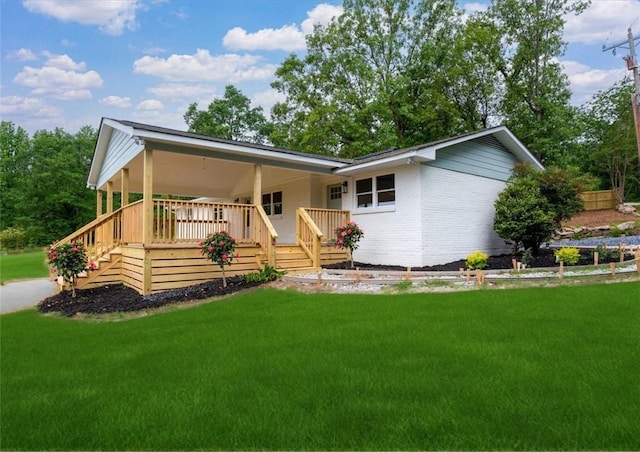 101 Fairview Dr, Greenville, SC 29609 - back of property featuring a lawn, brick siding, and stairway
