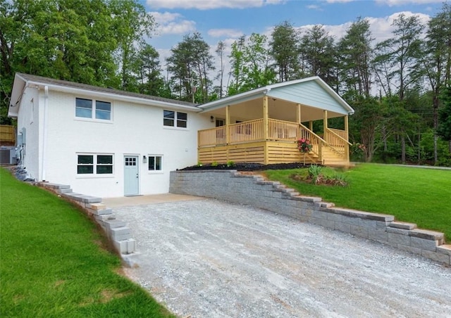 101 Fairview Dr, Greenville, SC 29609 - view of front of house with a front lawn, central AC unit, a patio, and covered porch