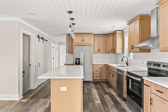 101 Fairview Dr, Greenville, SC 29609 - kitchen featuring appliances with stainless steel finishes, wall chimney exhaust hood, a sink, dark wood-style flooring, and a kitchen island