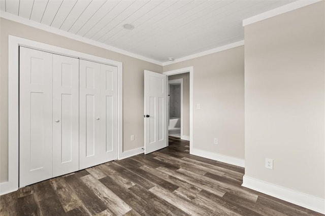 101 Fairview Dr, Greenville, SC 29609 - unfurnished bedroom featuring dark wood finished floors, baseboards, ornamental molding, a closet, and wooden ceiling