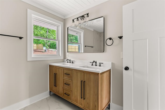 101 Fairview Dr, Greenville, SC 29609 - full bath featuring marble look tile flooring, baseboards, and double vanity