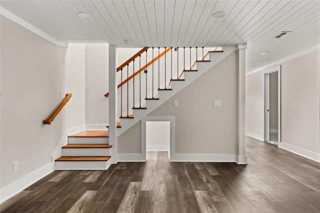 101 Fairview Dr, Greenville, SC 29609 - staircase featuring wood ceiling, wood finished floors, and baseboards