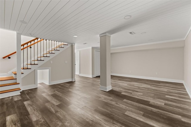 101 Fairview Dr, Greenville, SC 29609 - finished below grade area featuring stairway, dark wood finished floors, baseboards, wood ceiling, and ornamental molding