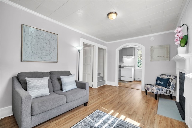 60 N Humphrey St, Inman, SC 29349 - living room with arched walkways, ornamental molding, wood finished floors, and stairway