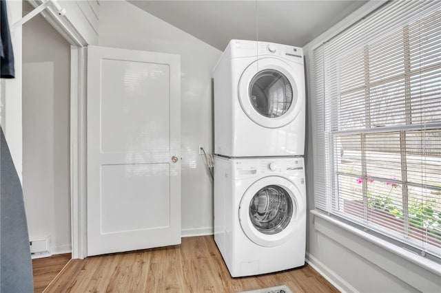 60 N Humphrey St, Inman, SC 29349 - laundry area featuring stacked washer / dryer and light wood-style floors