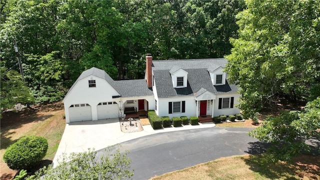 1211 Manse Jolly Rd, Anderson, SC 29621 - view of front facade featuring a chimney, concrete driveway, a shingled roof, and an attached garage