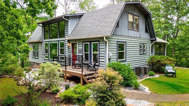 220 Family Dr, Seneca, SC 29678 - rear view of property featuring a wooden deck, a lawn, and cooling unit