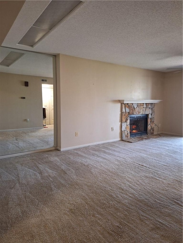 407 Northlake Dr, Anderson, SC 29625 - unfurnished living room featuring carpet floors, a fireplace, baseboards, and a textured ceiling