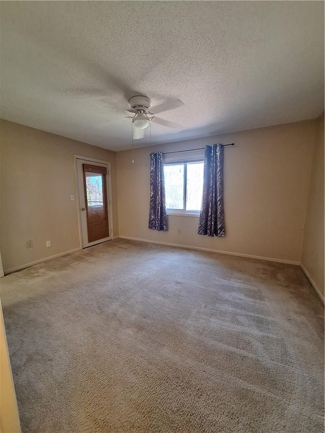 407 Northlake Dr, Anderson, SC 29625 - carpeted empty room with baseboards, ceiling fan, and a textured ceiling