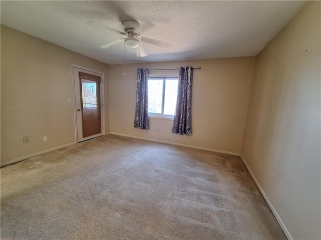 407 Northlake Dr, Anderson, SC 29625 - spare room featuring a textured ceiling, ceiling fan, baseboards, and carpet flooring