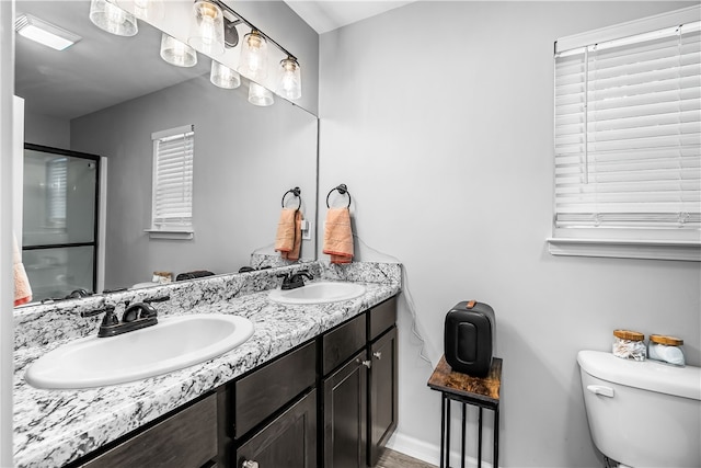 600 Brook St, Honea Path, SC 29654 - bathroom featuring double vanity and a shower with shower door
