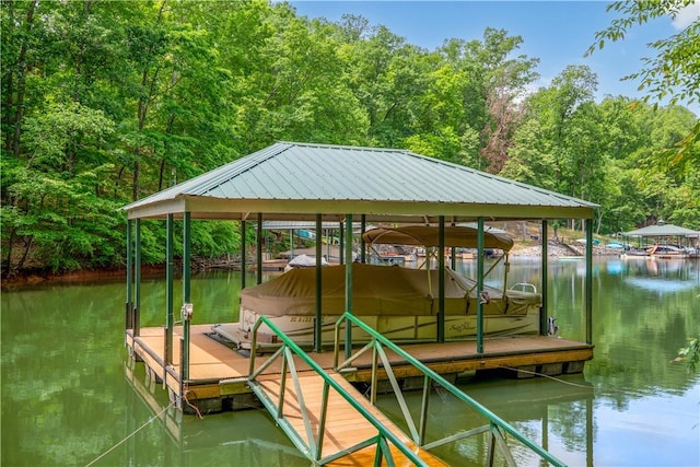 503 Greystoke Cv, Seneca, SC 29678 - dock area featuring a water view, boat lift, and a forest view