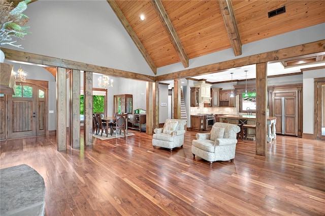 503 Greystoke Cv, Seneca, SC 29678 - living room featuring hardwood / wood-style flooring, high vaulted ceiling, wood ceiling, beamed ceiling, and decorative columns